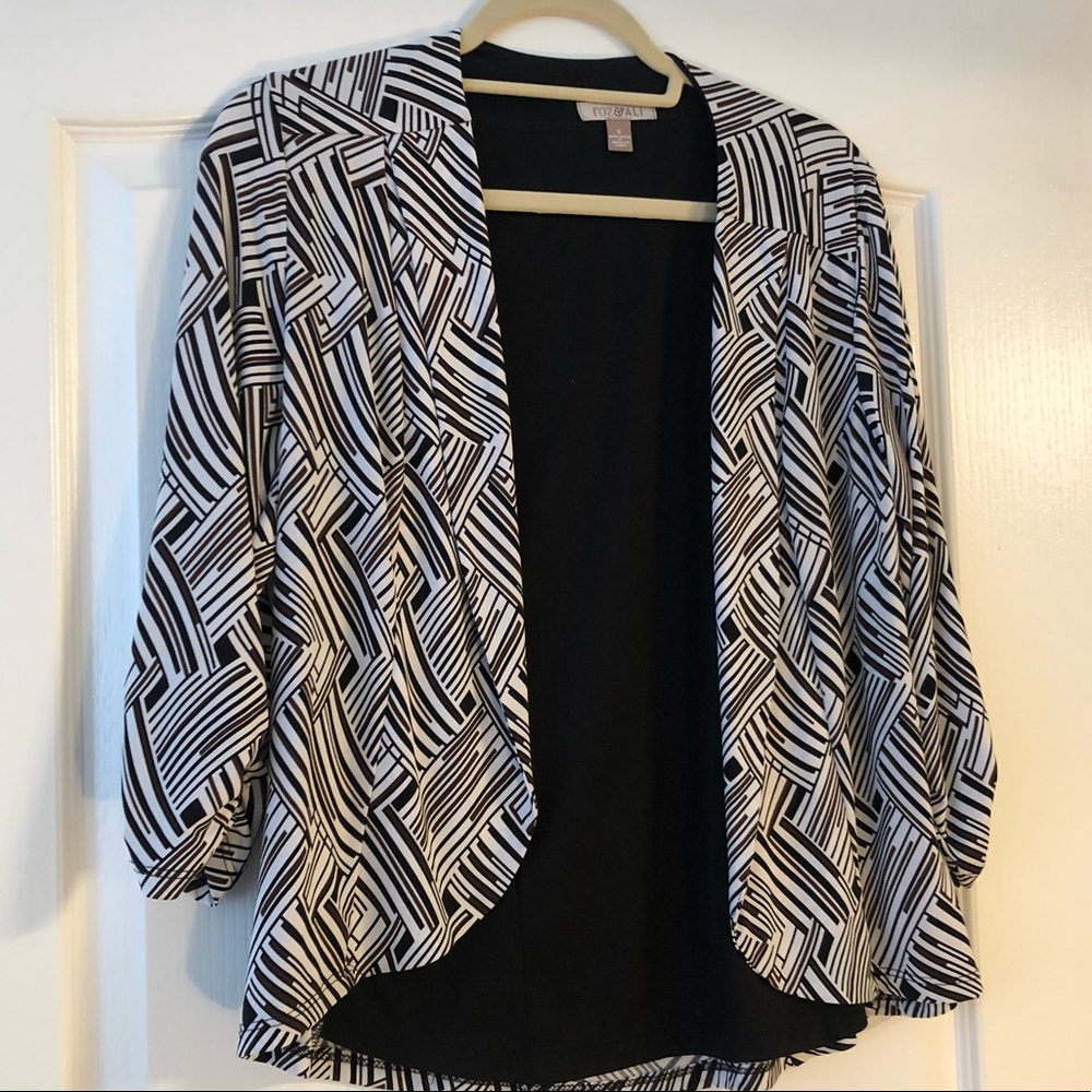 Black where and brown blazer